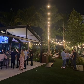 Carousel Club - Second bar, food trucks and grassy lounge area with games - Cocktail Bars Near Me - Hallandale Beach, Florida Carousel Club - Second bar, food trucks and grassy lounge area with games - Cocktail Bars Near Me - Hallandale Beach, Florida