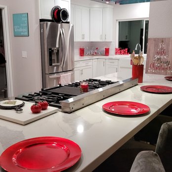 Delerio Construction - a kitchen with a stove and counter - General Contractors Near Me - Fresno, California