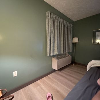 Cedarville Lodge - View of wall with window. - Hotels Near Me - Cedarville, Michigan Cedarville Lodge - View of wall with window. - Hotels Near Me - Cedarville, Michigan