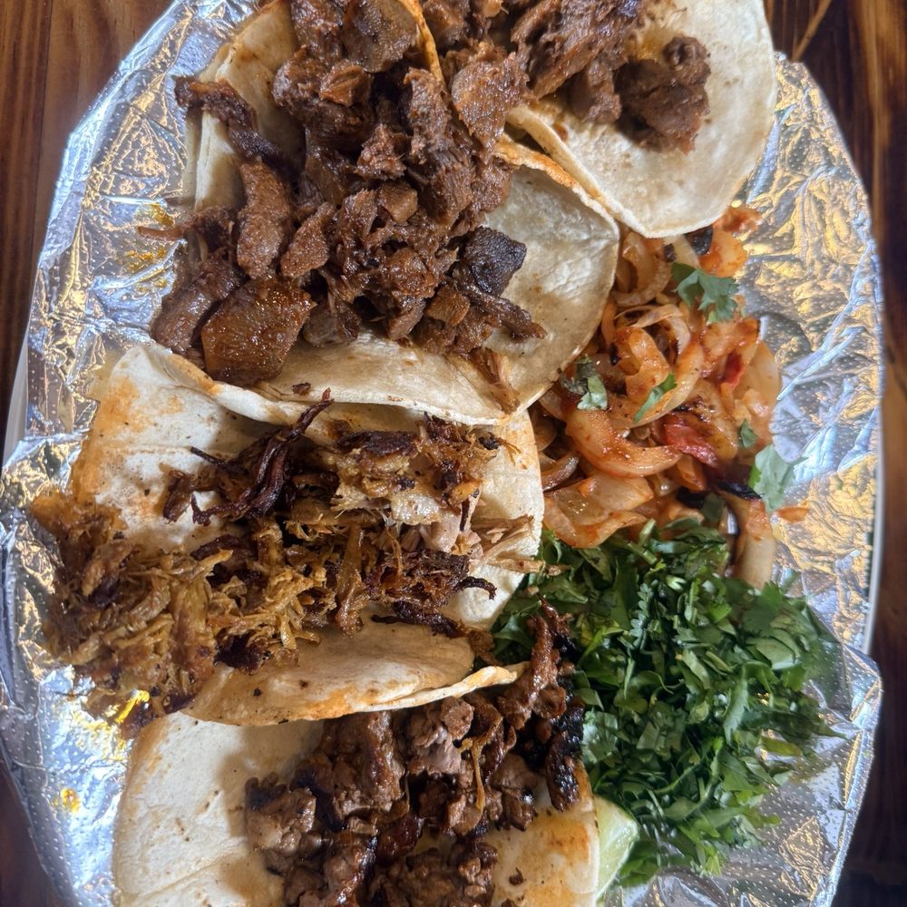 El Mezcal Mexican Restaurant Mount Dora - 2tacos of lengua (beef tongue) 1tacos of asada (steak) 1tacos of carnitas(pull pork) With cilantro and onions - Mexican Near Me - Mt Dora, Florida