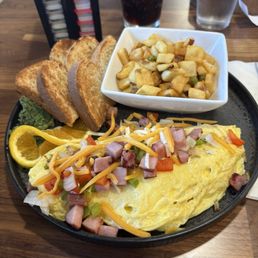 Omelet and potatoes and toast