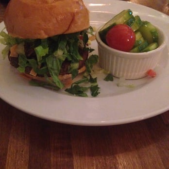 Iron Rooster - Sante Fe Veggie Burger with cucumber & tomato salad - American Near Me - Baltimore, Maryland Iron Rooster - Sante Fe Veggie Burger with cucumber & tomato salad - American Near Me - Baltimore, Maryland