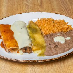 La Calera Mexican Bar & Grill - Trio Enchilada 16.00
1 chicken enchilada w/ red sauce,
1 beef enchilada w/ cheese sauce,
1 cheese enchilada w. green salsa, rice & beans