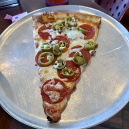 A slice of pepperoni and jalapeño