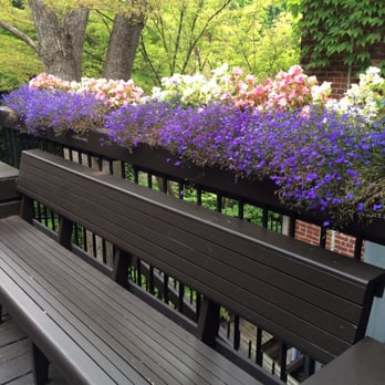 Gertrude Bowmer Members' Lounge - row of benches on a deck - Lounges Near Me - Ashland, Oregon Gertrude Bowmer Members' Lounge - row of benches on a deck - Lounges Near Me - Ashland, Oregon