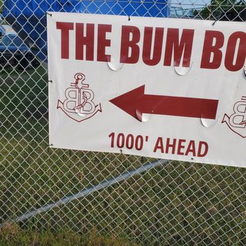 The Bum Boat - a sign with an arrow pointing to the boat - Dive Bars Near Me - Ashtabula Township, Ohio The Bum Boat - a sign with an arrow pointing to the boat - Dive Bars Near Me - Ashtabula Township, Ohio