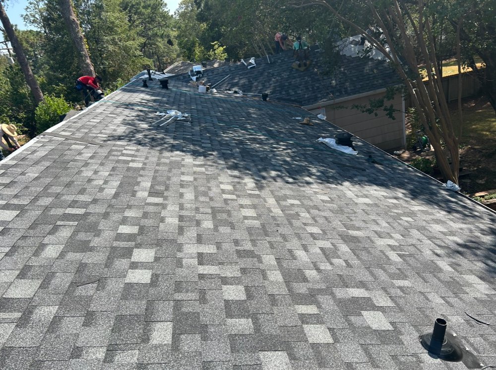 Slide of Monarch Roofing