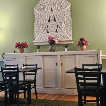 El Mezcal - a table and chairs in a restaurant - Salad Near Me - Dell Rapids, South Dakota