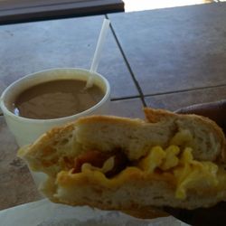 East Lake Food Market - Cafe con leche and half of a Bacon, egg and cheese breakfast sandwich.