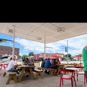 Ladybird Brewing - a group of people sitting at picnic tables - Breweries Near Me - Winfield, Kansas Ladybird Brewing - a group of people sitting at picnic tables - Breweries Near Me - Winfield, Kansas
