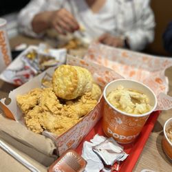 Popeyes Louisiana Kitchen - We did half spicy and half regular chicken tenders and they were freshly made and so bomb! Yummy!