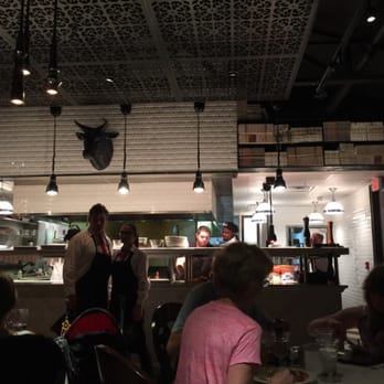 The Continental - Quick snapshot of their kitchen, lots of yummy food in there! - Steakhouses Near Me - Naples, Florida