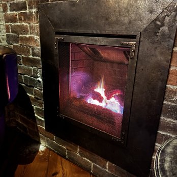 The Elk Room - Fireplace in the lounge area - Speakeasies Near Me - Baltimore, Maryland