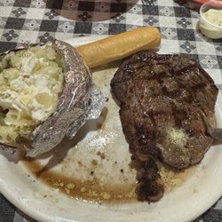 Farmhouse Country Cafeteria - 14 oz ribeye w/bake potato and garlic bread