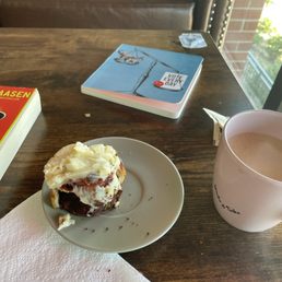 Cinnamon roll, latte, pro-democracy reading material Cinnamon roll, latte, pro-democracy reading material