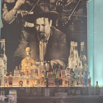 Uncle Julio's - Cool picture behind some of their alcohol selections - Tex-Mex Near Me - Woodbridge, Virginia Uncle Julio's - Cool picture behind some of their alcohol selections - Tex-Mex Near Me - Woodbridge, Virginia