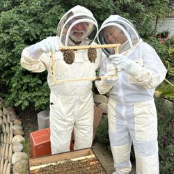Girl Next Door Honey - New beekeepers during a one on one beekeeping mentoring session with Hilary.