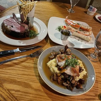 Lancelot Restaurant - Roasted chicken breast &  King Arthur Cut with Alaskan King Crab Legs - Steakhouses Near Me - Vail, Colorado