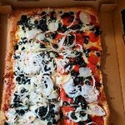 Pizza Man of Cumberland - Large onion olive on whole with pepperoni on half. Yummy