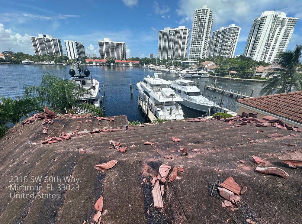 Slide of Mighty Dog Roofing Broward