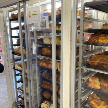 Sonora Bakery - Workers picking out bread we ask for. - Bakeries Near Me - Los Angeles, California Sonora Bakery - Workers picking out bread we ask for. - Bakeries Near Me - Los Angeles, California