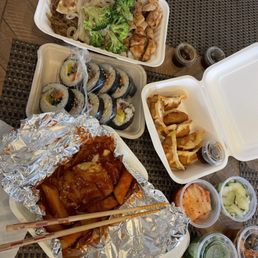 Kimbap, tteokbboki, banchan, yakimandu, chicken teriyaki bowl Kimbap, tteokbboki, banchan, yakimandu, chicken teriyaki bowl