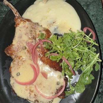 The Husky - Tomahawk pork chop - Burgers Near Me - New Orleans, Louisiana The Husky - Tomahawk pork chop - Burgers Near Me - New Orleans, Louisiana