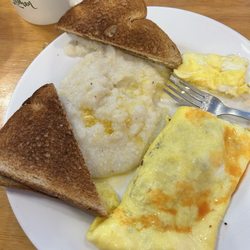 Sunrise Cafe - Grits with a sausage and bacon omelet