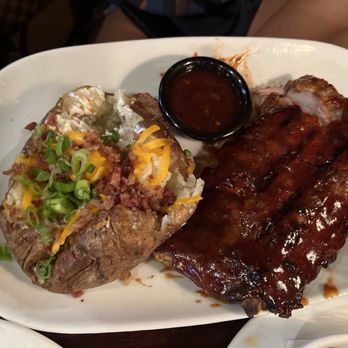 LongHorn Steakhouse - Baby back ribs, and a loaded baked potato - Steakhouses Near Me - Jacksonville, Florida