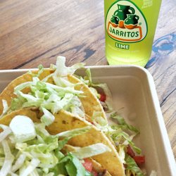Mad Mex - Barbacoa beef tacos. Jarrito lime