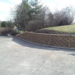 Reliable Landscaping and Irrigation - Hillside was eroding. We constructed this retaining wall for long term stability