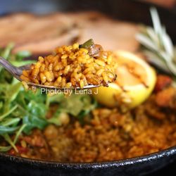 La Marcha Tapas Bar - Close up of Paella Tres Cerditos ($52) - roasted pork shoulder, panceta, chorizo, cider, arugula. Good. A bit on the saltier side.