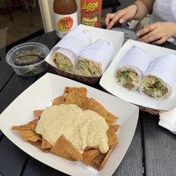 Livi's Pockets - Gyro + Falafel Wrap, Chicken + Falafel Wrap, Grape Leaves (Dolma), and Restaurant Chips with Hummus