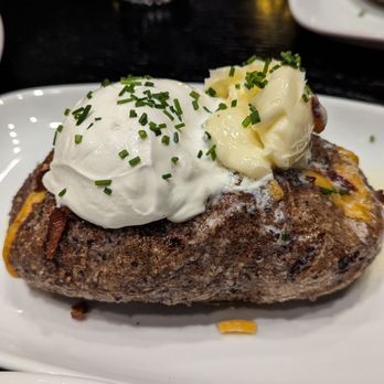 Carbon Steak - Loaded baked potato - Steakhouses Near Me - Milwaukee, Wisconsin Carbon Steak - Loaded baked potato - Steakhouses Near Me - Milwaukee, Wisconsin