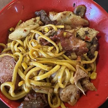 Yummy Bowl - My husbands meat bowl. Noodles, steak, imitation crab, shrimp, chicken, smoked sausage, pork, bacon, mushrooms and jalapenos. - Mongolian Near Me - Fishers, Indiana