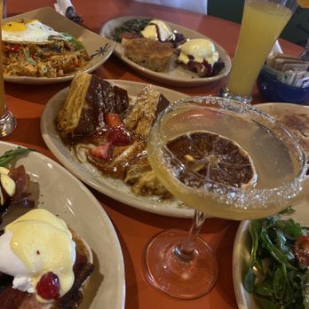 Snooze, an A.M. Eatery - Spread of food - Breakfast & Brunch Near Me - Orange, California