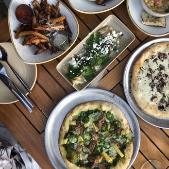 Monkeypod Kitchen - Kalua Pork pizza with Jalapeño and pineapples, Wood - Roasted Free Range Chicken Wings - Hawaiian Near Me - Kapolei, Hawaii Monkeypod Kitchen - Kalua Pork pizza with Jalapeño and pineapples, Wood - Roasted Free Range Chicken Wings - Hawaiian Near Me - Kapolei, Hawaii