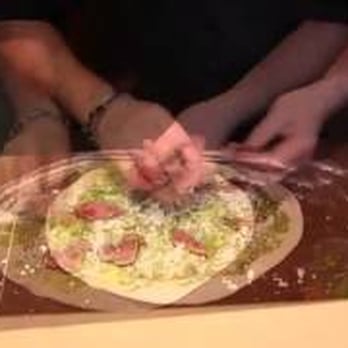 Urban Crust - Preparing Black & Blue Pizza at Urban Crust - Pizza Near Me - Plano, Texas Urban Crust - Preparing Black & Blue Pizza at Urban Crust - Pizza Near Me - Plano, Texas