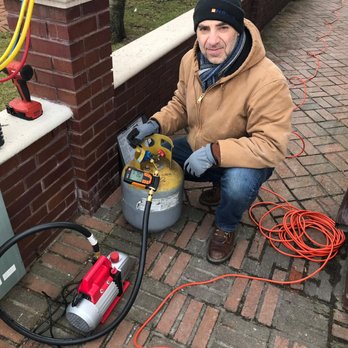 Premier HVAC Services - Our senior tech doing installation of mini split for private house in Staten Island. - Heating & Air Conditioning/HVAC Near Me - Staten Island, New York
