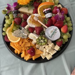 Cheese and fruit tray.