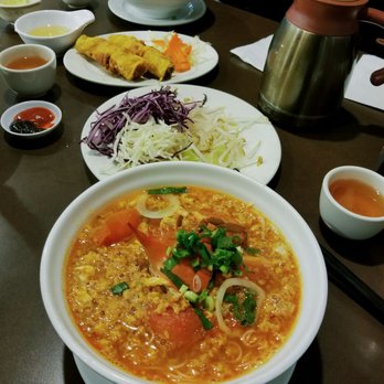 Bong Lua Vietnamese Restaurant - Bun Rieu  - Tomato-y and crab-by deliciousness! Behind the bean sprouts are the spring rolls. - Vietnamese Near Me - Scarborough, Ontario