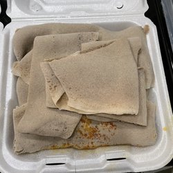 Mesob Cafe - Shrimp curry - surprise buried in a generous pile of injera!