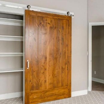 Wausau Homes - a closet with a sliding door - General Contractors Near Me - Indianola, Iowa Wausau Homes - a closet with a sliding door - General Contractors Near Me - Indianola, Iowa