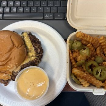 Cow & Cheese - The DOC with a side of beer cheese sauce and CC sauce. Kwame B's Secret Rub Fries with pickled jalepenós - Burgers Near Me - Winter Park, Florida
