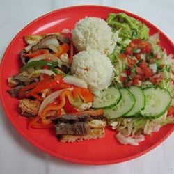 Antojitos Cafe - Mix fajitas ,made w/grilled chicken&stack sate w/veg.and salad.