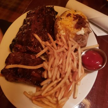 Mike's American - Ribs and fries with baked potato - American Near Me - Springfield, Virginia