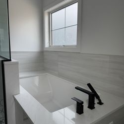 J&C Kitchen & Bath - Bathtub stone