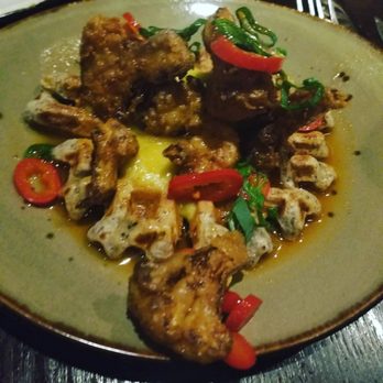 Abreo Restaurant - fried cauliflour with blue corn waffles drizzled in curry honey butter!! - Tapas Bars Near Me - Rockford, Illinois Abreo Restaurant - fried cauliflour with blue corn waffles drizzled in curry honey butter!! - Tapas Bars Near Me - Rockford, Illinois