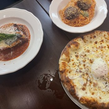 Mad Bene - Left to Right: Lasagna (special), Spaghetti and Meatballs, and Carbonara Pizza - Italian Near Me - Kapolei, Hawaii Mad Bene - Left to Right: Lasagna (special), Spaghetti and Meatballs, and Carbonara Pizza - Italian Near Me - Kapolei, Hawaii