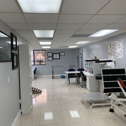 Advance Therapy Center - View of the center from the center with strength training equipment.